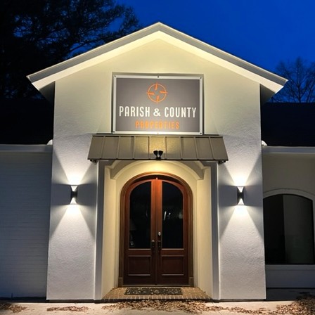 Parish & County Properties Woodville office — glass door signage